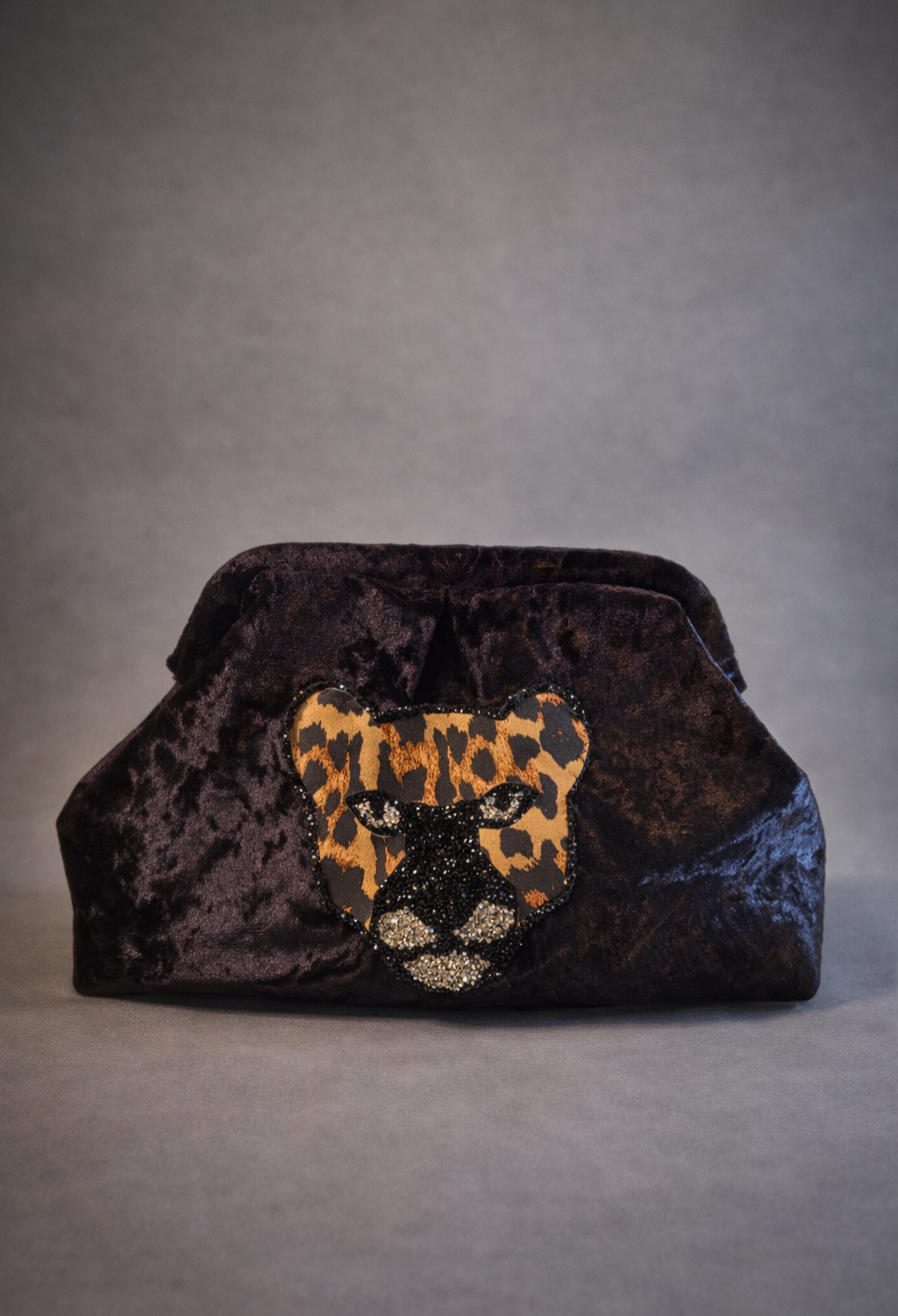 NOIR LEOPARD CLUTCH